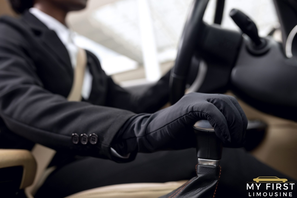 chauffer drives limousine